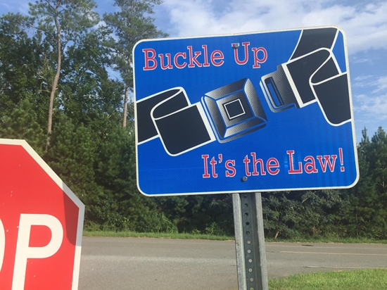 Buckle Up - It's the Law! Seat Belt/Seatbelt Metal Sign, Reflective, Pre-punched Holes, Overlaminate Option, Quality Materials for Long Life - PL-1005